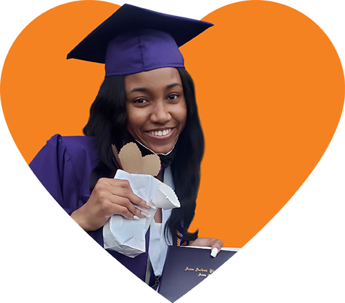 Participant in graduation cap and gown