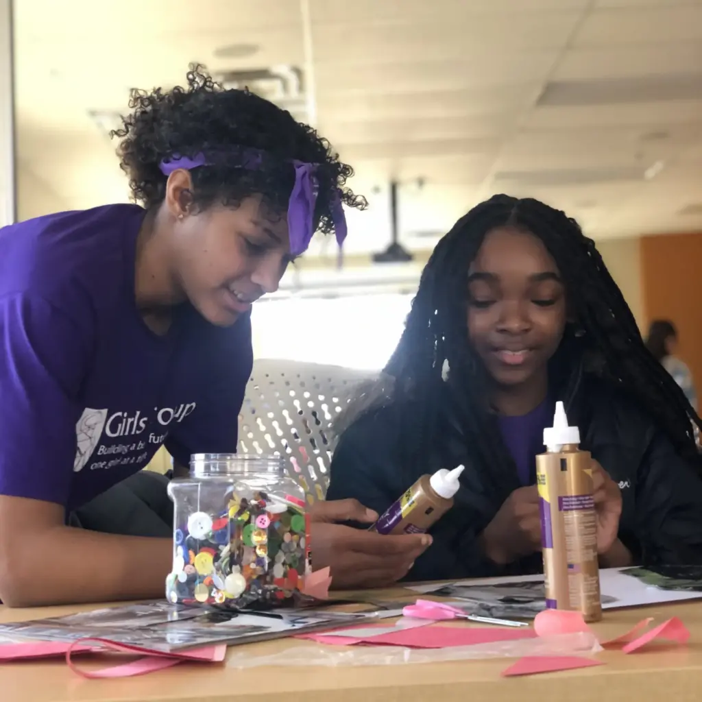 Participants working with art supplies