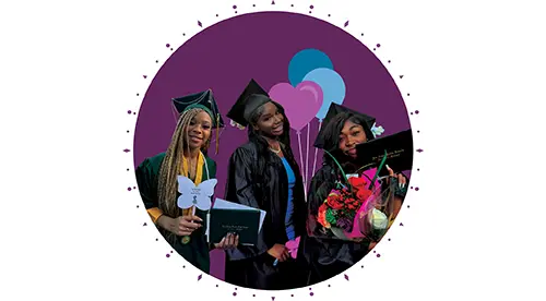 Three graduates holding diplomas and flowers